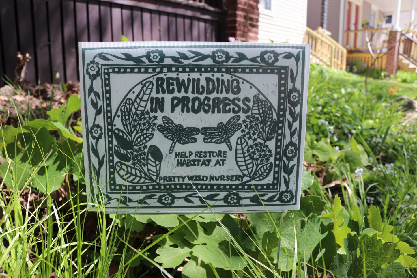 Rewilding In Progress yard sign