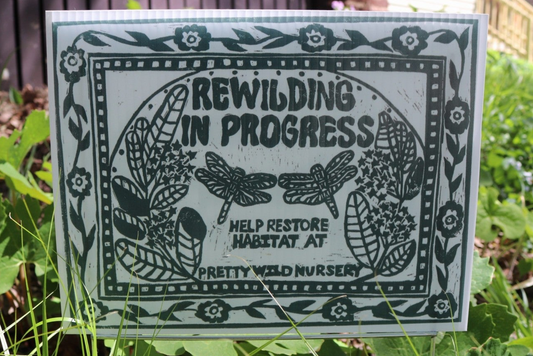 Rewilding In Progress yard sign